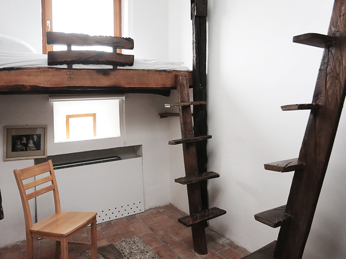Wooden furniture in cell 117
